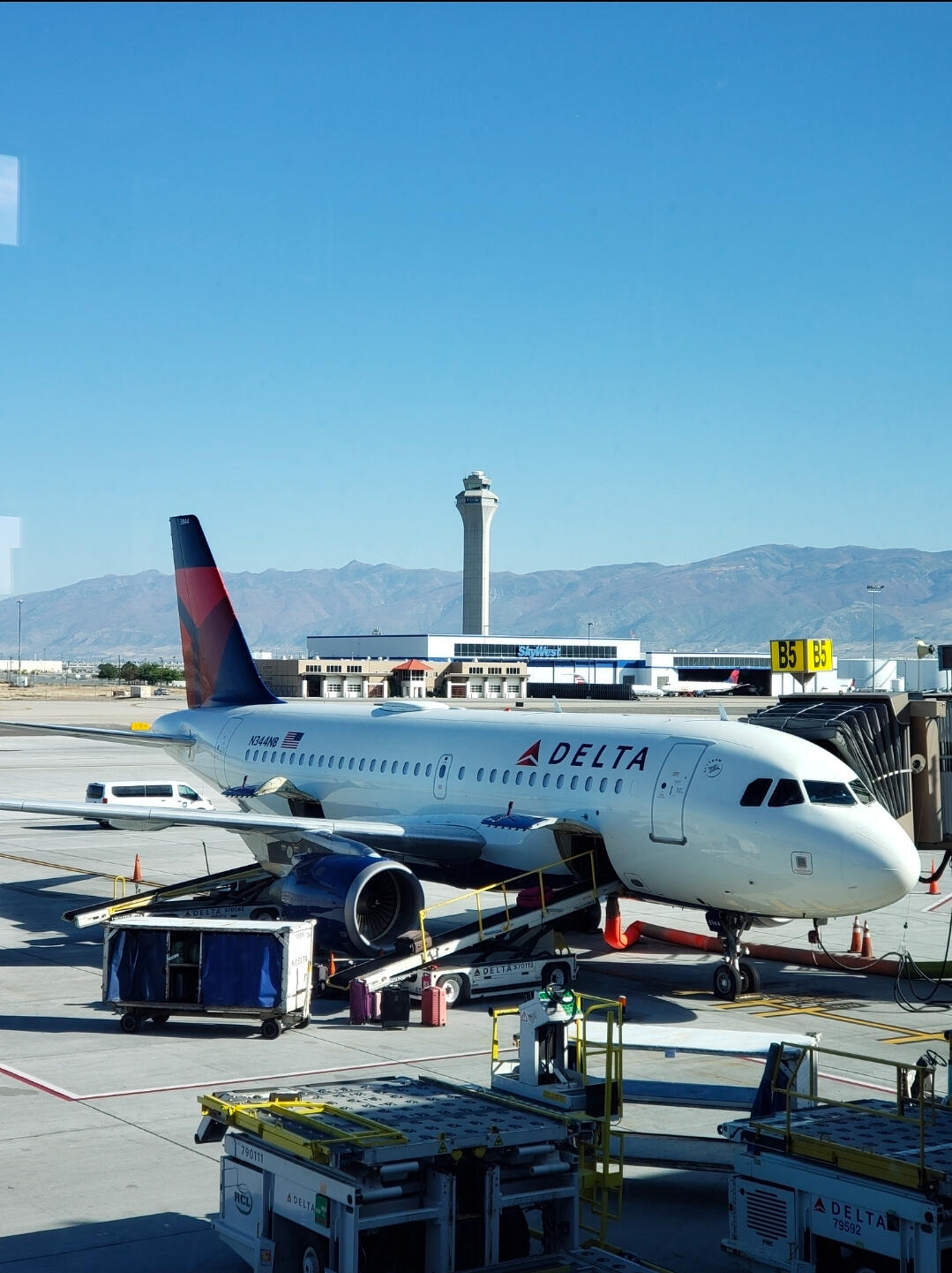 Commercial travel and hospitality photography featuring a Delta aircraft at the airport by LuxeGrid Media.